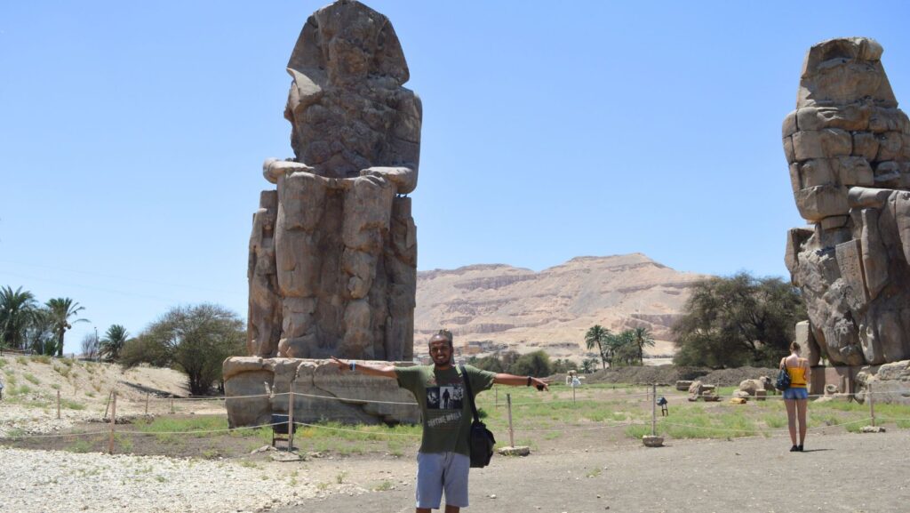 The Colossi of Memnon statues standing tall on Luxor's west bank